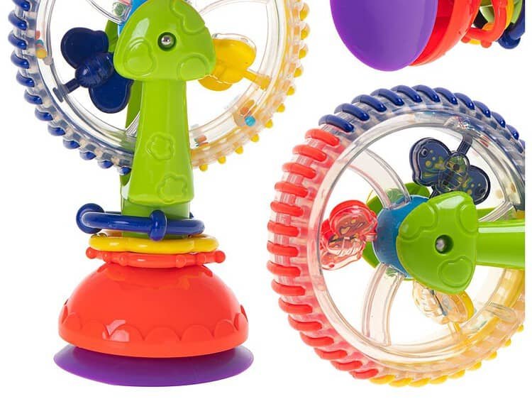Zornăit roata Ferris cu ventuză de aspirație - O jucărie colorată pentru copii în formă de roată de mare. Jucăria are o funcție de zornăit. Ideal pentru a se juca în apă. Echipat cu ventuze