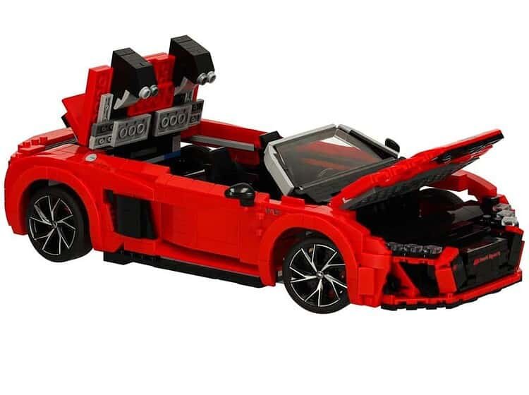 Mașină de jucărie LEGO, model sport roșu, pentru copii, perfectă pentru joacă creativă.