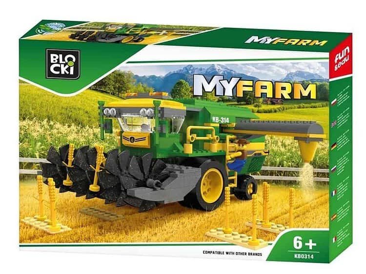 ci si o figurina fermier si 4 suporti cu 12 plante de porumb.