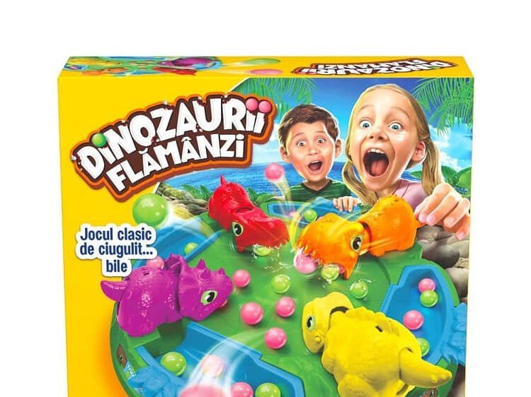 - Varsa toate bilutele colorate in mijlocul platformei cu dinozauri