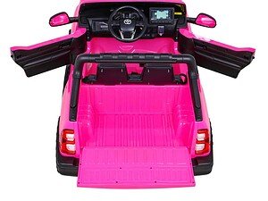 Jucărie electrică pentru copii, mașină de culoare roz, cu interior detaliat și funcționalități.