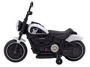 Cute black and white children's electric motorcycle toy for kids play outside.