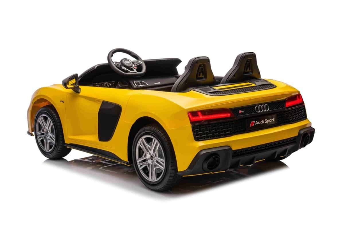 Mașinuță electrică pentru copii Audi Sport, model sportiv galben, ideală pentru joacă și aventură.