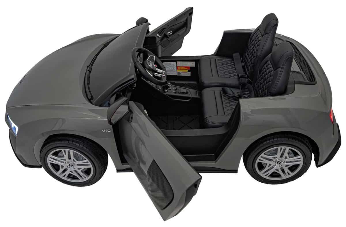 Mașini electrice pentru copii, model sport cu interior detaliat și deschis pentru joacă.