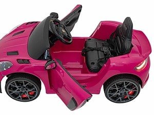 Mașinuță electrică pentru copii roz, jucărie de exterior, perfectă pentru mici șoferi entuziaști.
