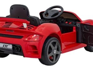 Mașinuță electrică pentru copii, roșie, cu design sportiv și detalii realiste, ideală pentru joacă și aventuri.