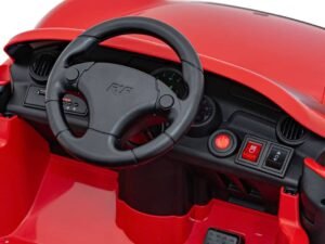 Mașină de jucărie roșie pentru copii, detaliu bord și volan autentic, jucării educative și distractive.