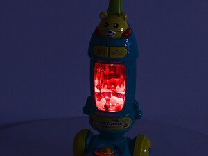 Vaca de jucarie cu lumini si sunete, pentru copii, design colorat si distractiv, perfect pentru camera copilului.