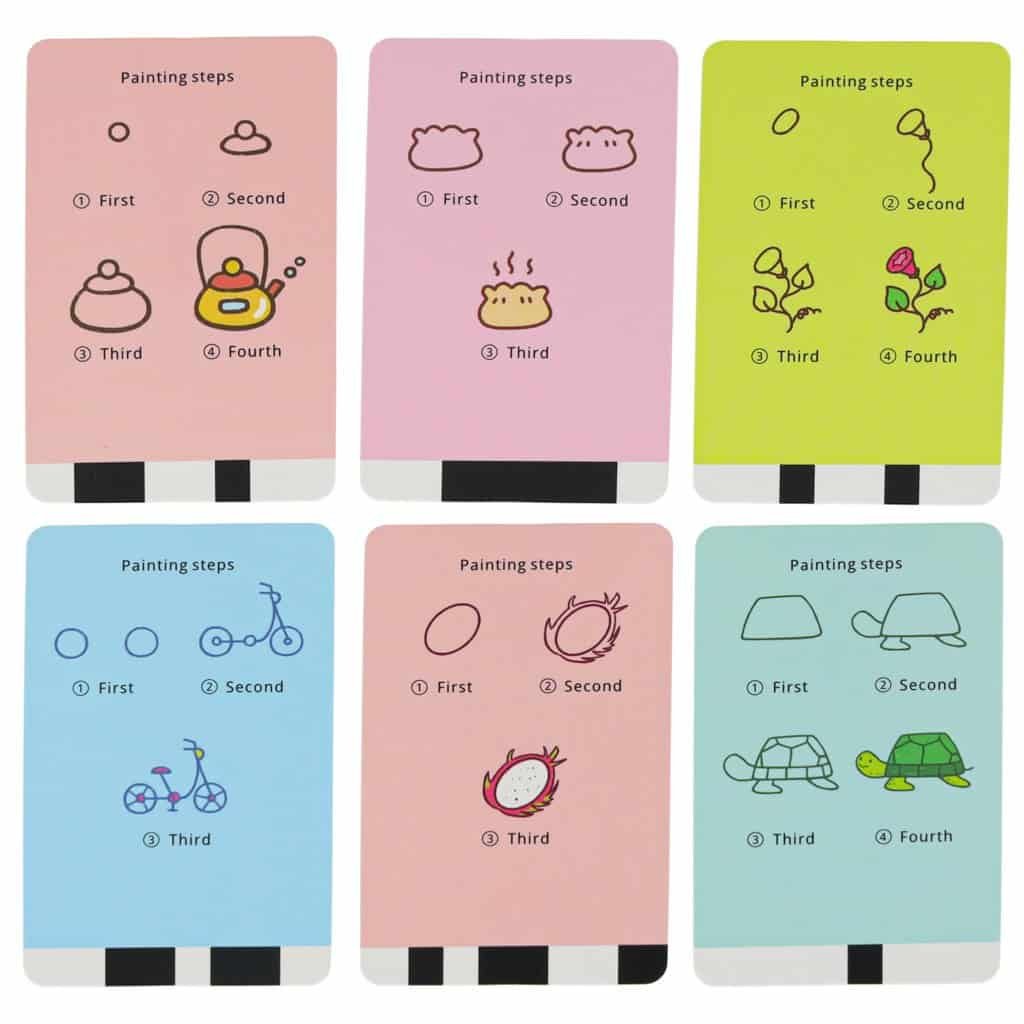 Uşi de joacă pentru copii în formă de case, cu modele de pictură pentru inspirație artistică.