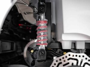 1. Suspensie cu arc roșu pentru mașini electrice de joc, calitate superioară.