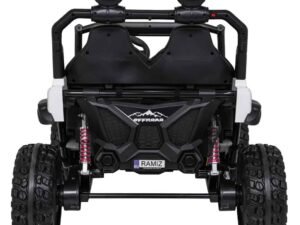 Mașinuță electrică pentru copii off-road, robustă și sigură pentru aventuri în aer liber.