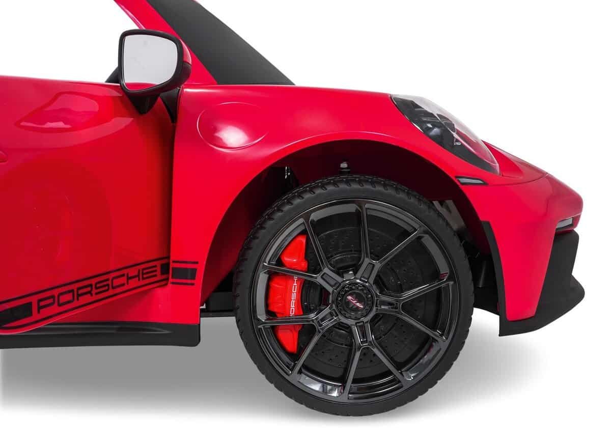 Mașină de jucărie Porsche roșie, detalii realiste, ideală pentru copii și colecții.