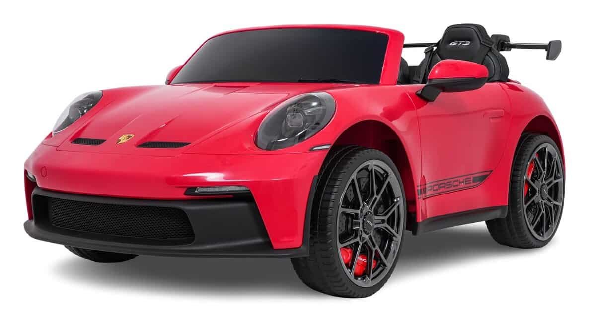 Mini mașină electrică pentru copii în stil sport Porsche, culoare roșie, ideală pentru joacă în aer liber.