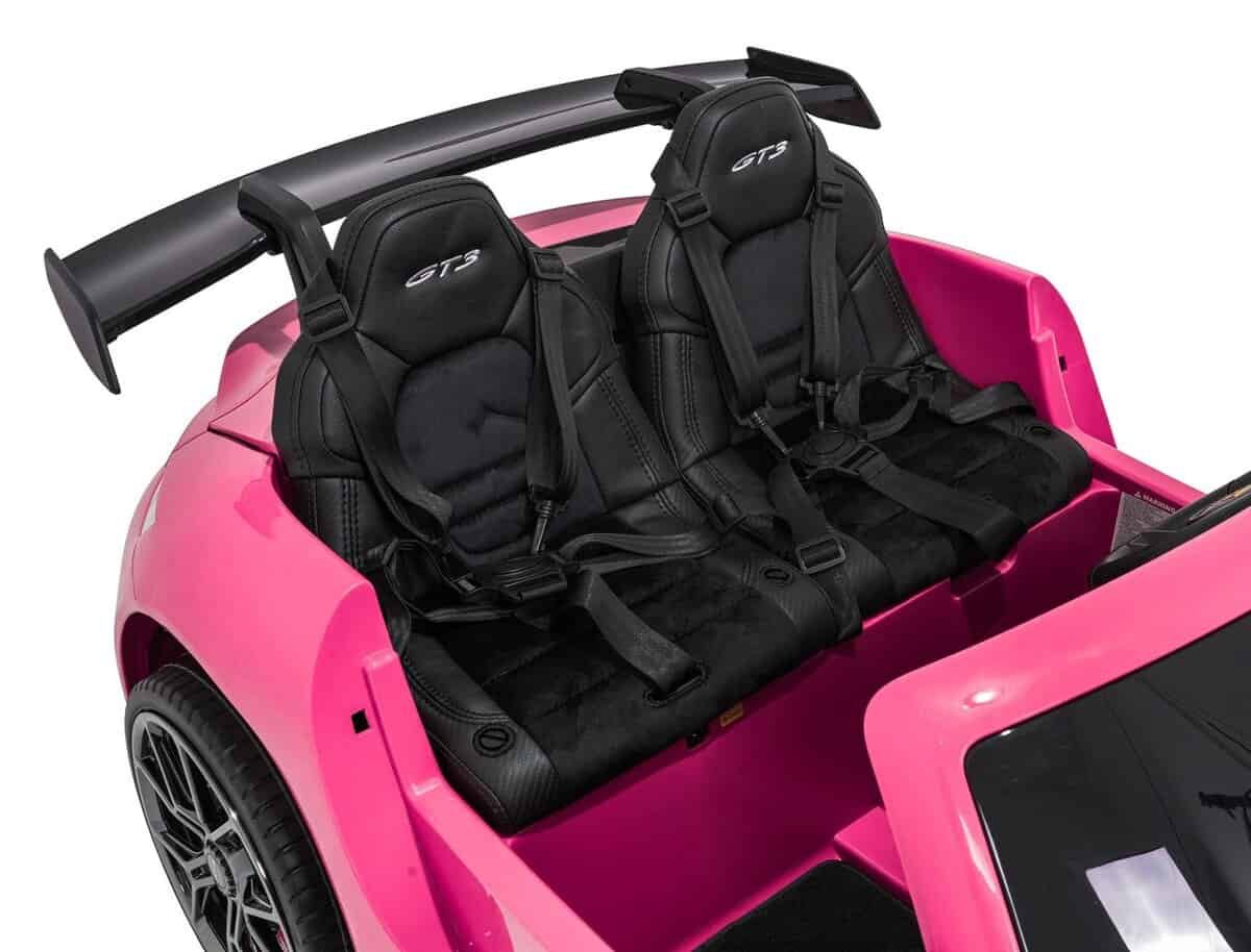 1. Scaune pentru copii în mașinuță electrică roz și negru, siguranță și confort.