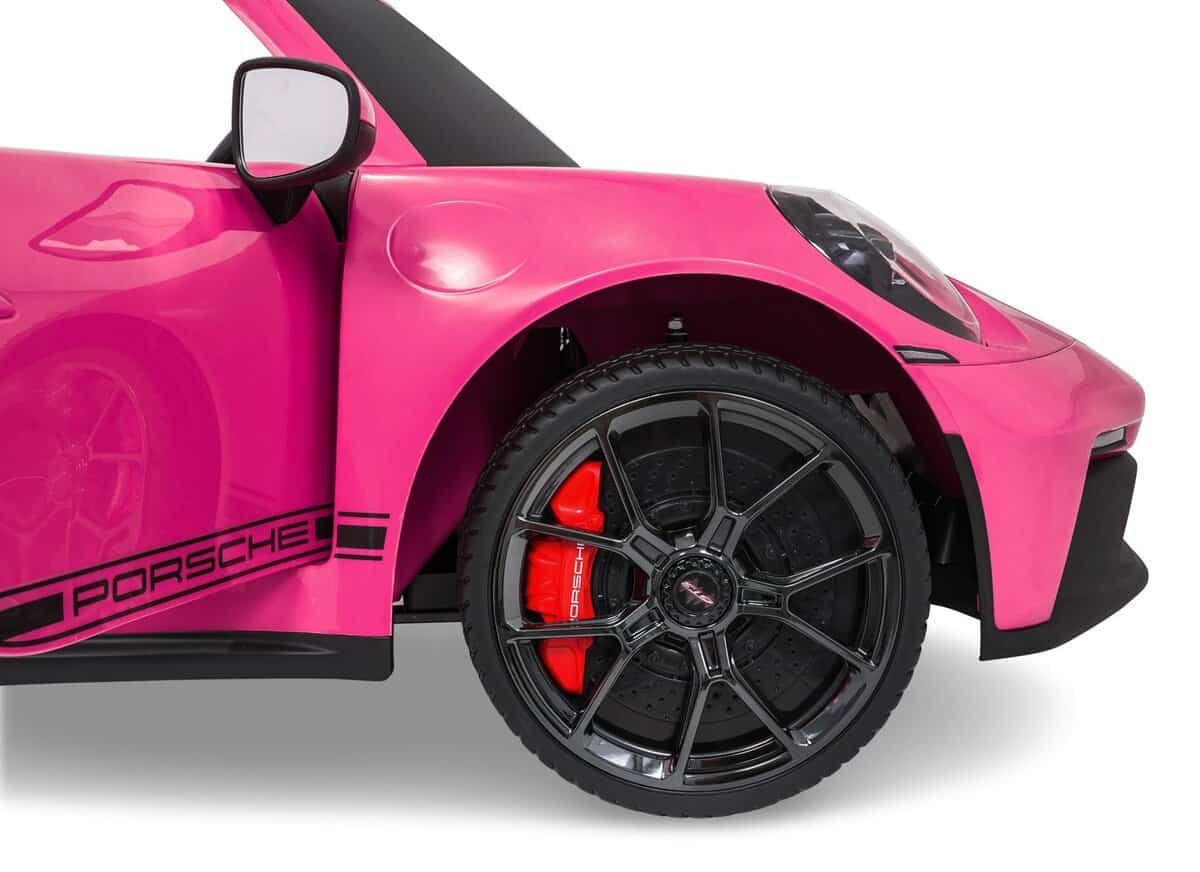 Mașină sport pentru copii Porsche, roz, detalii realiste și design atractiv pentru joc și divertisment.
