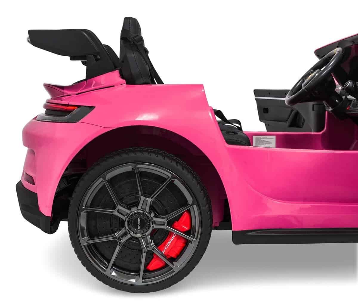 Mașinuță electrică pentru copii roz, model sport, perfectă pentru distracție.