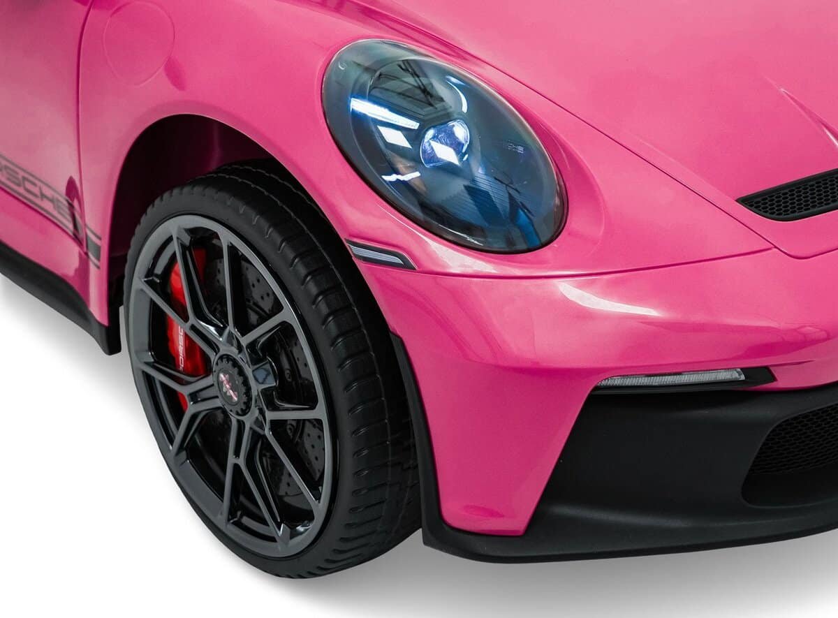 Jucarie masina sport roz pentru copii, realistă și distractivă.