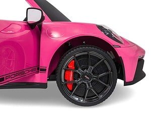 Mașină de jucărie Porsche roz pentru copii, detaliu cu roți și design realist.