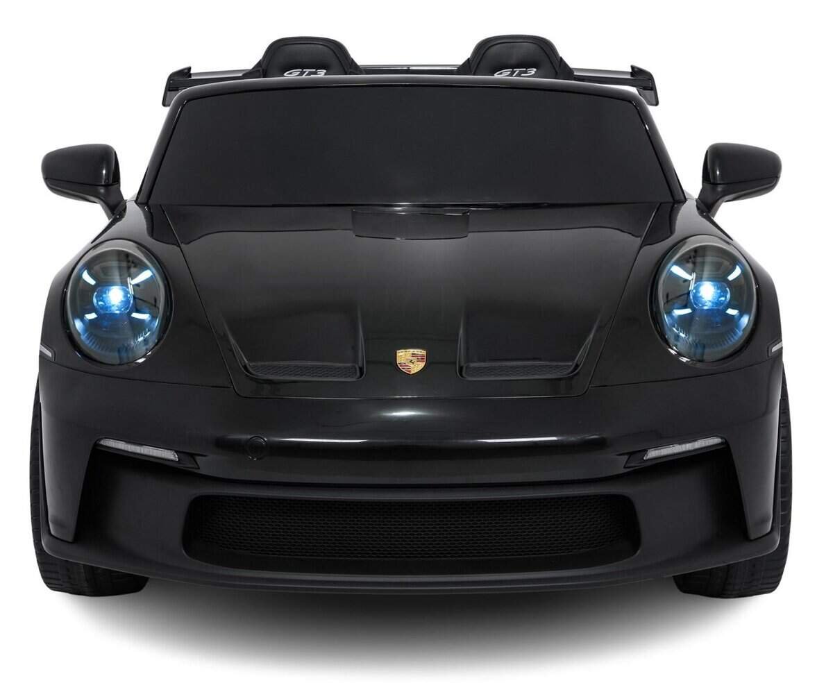 Mașină Porsche neagră, vedere frontală, design sportiv, lumină albastrie, imagine elegantă.