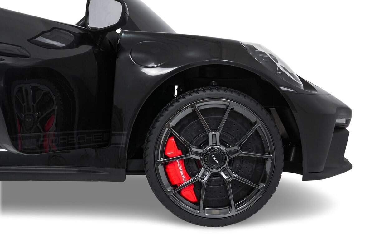 1. Jantă sport neagră cu disc și frână roșie, mașină sport Porsche.