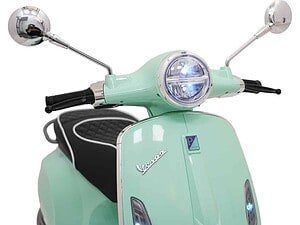 Scooter vintage color mint cu lumină frontală LED, stil retro.