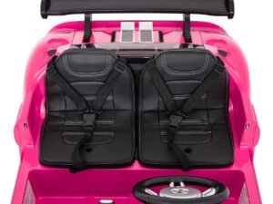 Jucărie mașinuță electrică roz pentru copii, cu scaune și volan realist.