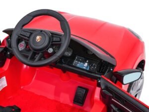 Mașinuță electrică pentru copii, model sport roșu cu interior detaliat, pentru distracție sigură.