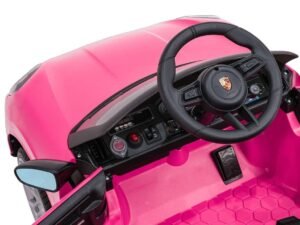 1. buton, volan și pedală pentru mașinuțe electrică pentru copii, în culoare roz.