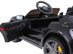 1. Mașină electrică de copil Porsche neagră, cu deschidere laterale și interior detaliat.
