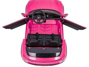 Mașină electrică pentru copii roz cu volan și scaune, perfectă pentru distracție în aer liber.